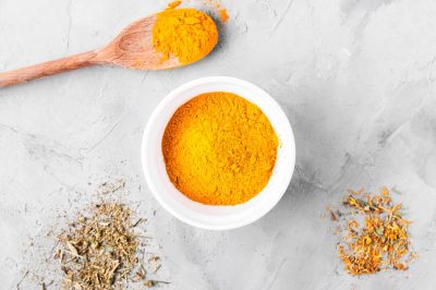 top-view-turmeric-condiment-concept_23-2148579403